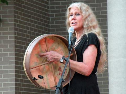 Barbara playing the bodhran